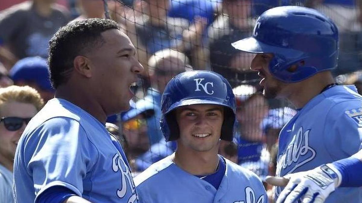 
Royals catcher Salvador Perez (left) made a big throw in the seventh inning, then congratulated Paulo Orlando after Orlando’s homer in the eighth inning.
