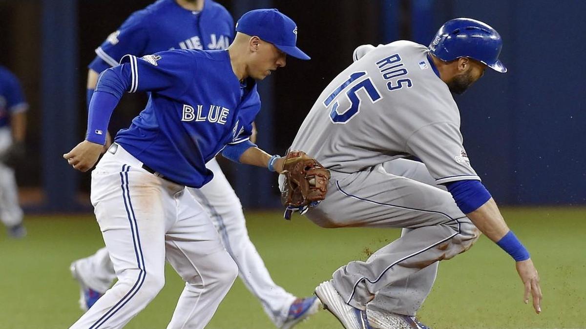 Toronto Blue Jays second baseman Ryan Goins still had his glove on Kansas City Royals right fielder Alex Rios when Rios’ feet came off the bag on an attempted steal in the fourth inning of Game 4 of the ALCS.