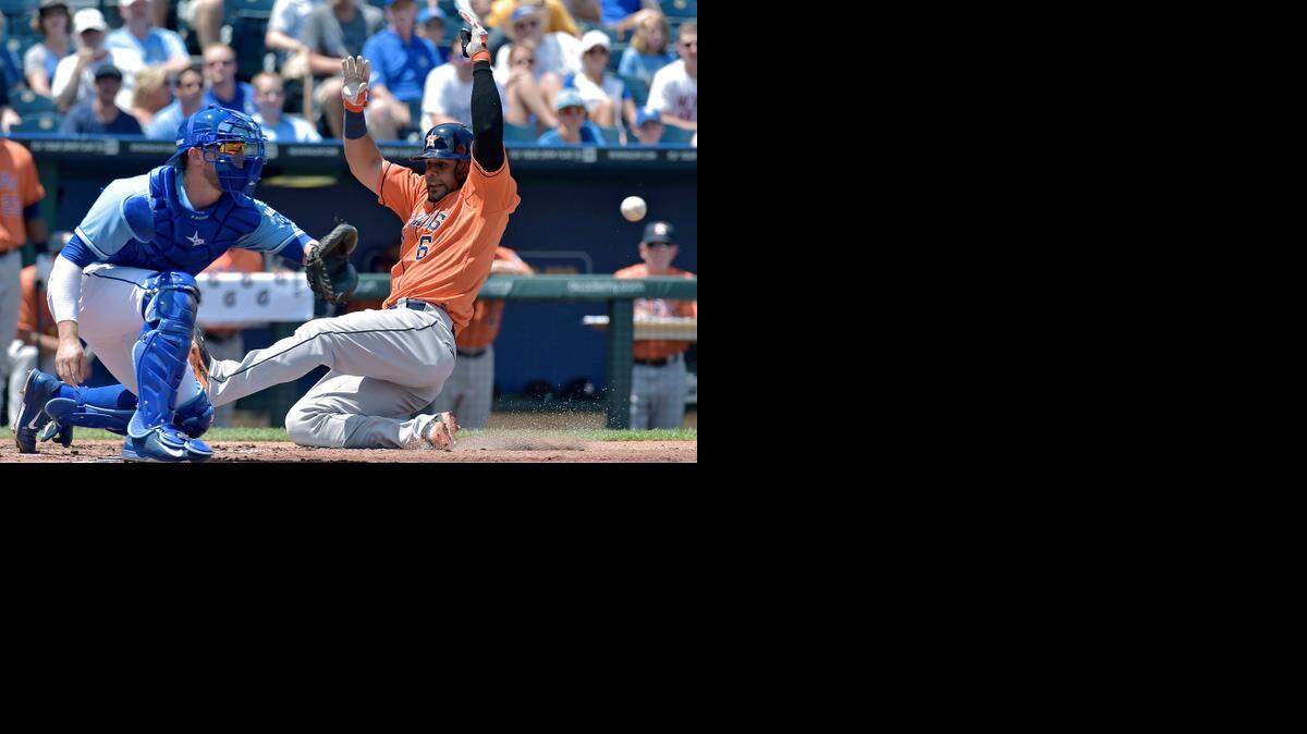 
Jonathan Villar (6) scored one of the Houston Astros’ nine runs Wednesday when Dexter Fowler’s double drove in two runs in the second inning. The throw was too late for Royals catcher Brett Hayes to make the tag. 


