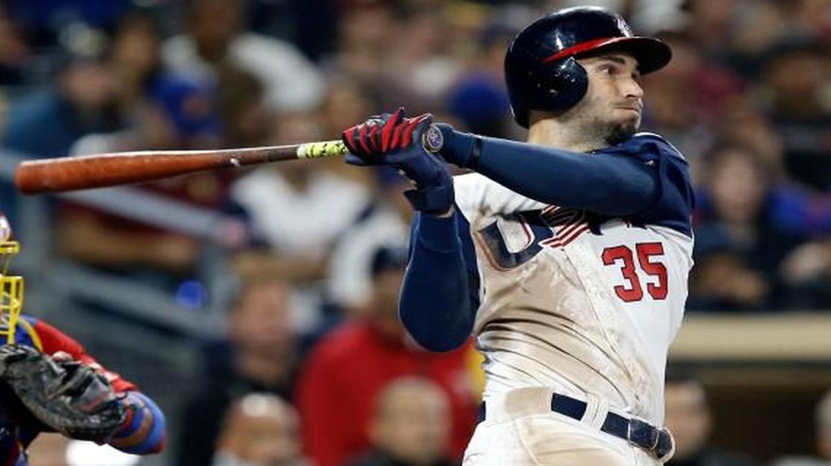 Eric Hosmer of the United States watched in front of Venezuela catcher Robinson Chirinos as he hit a two-run home run in the eighth inning of a second-round World Baseball Classic game Wednesday night in San Diego. The United States won 4-2.