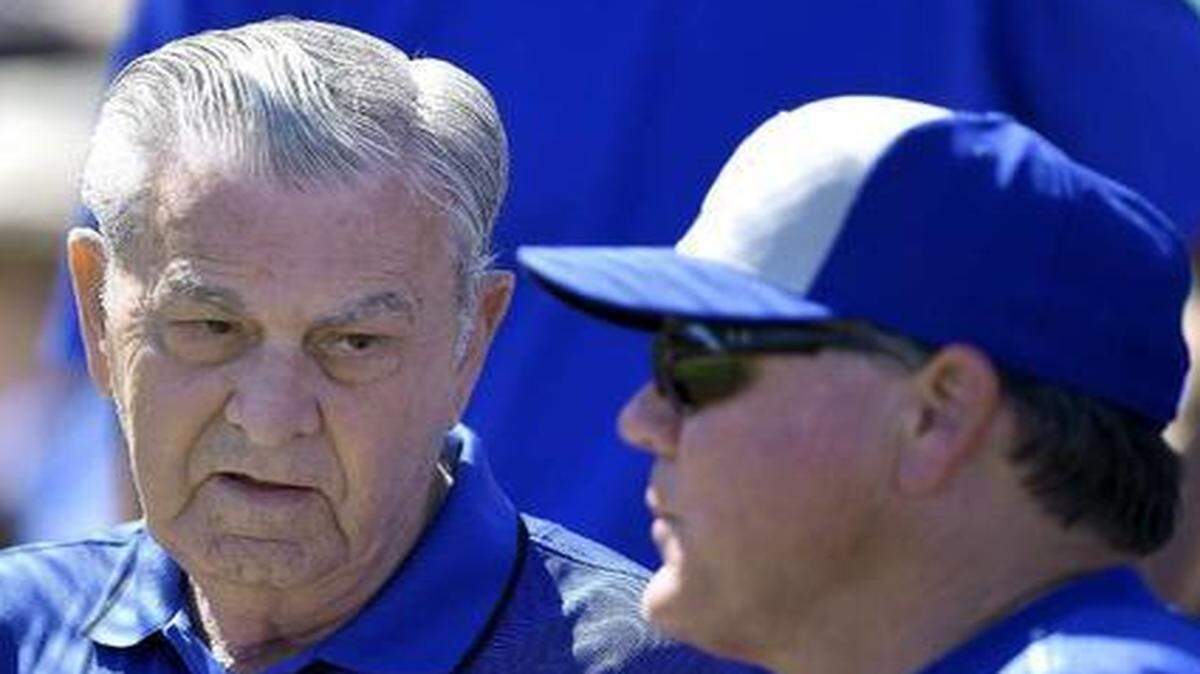 
Royals owner David Glass (left) and manager Ned Yost watched a group of players in spring training that is projected to receive $113,618,650 this season.

