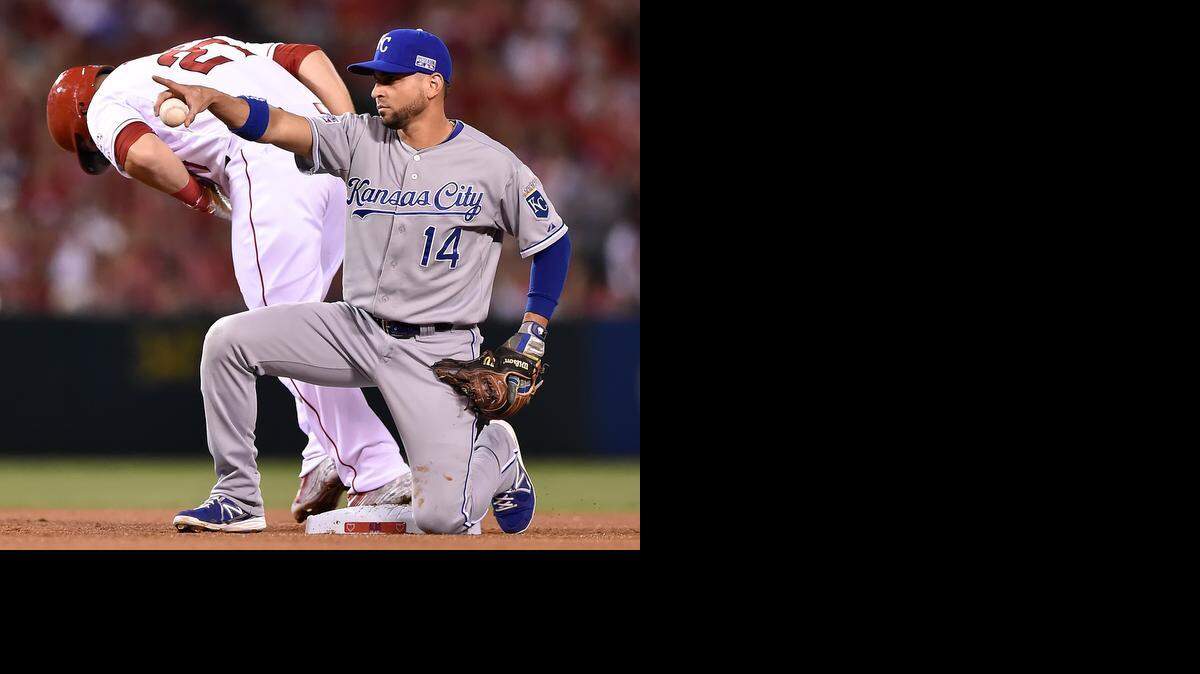 
Royals second baseman Omar Infante (right) pointed to catcher Salvador Perez after Perez’s throw caught Mike Trout of the Angels trying to steal second. 



