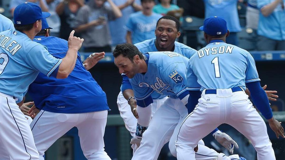 
The Royals’ Paulo Orlando celebrated with teammates at home plate after his grand slam in the bottom of the ninth inning of a 9-5 win over the Tampa Bay Rays in Tuesday’s game at Kauffman Stadium.
