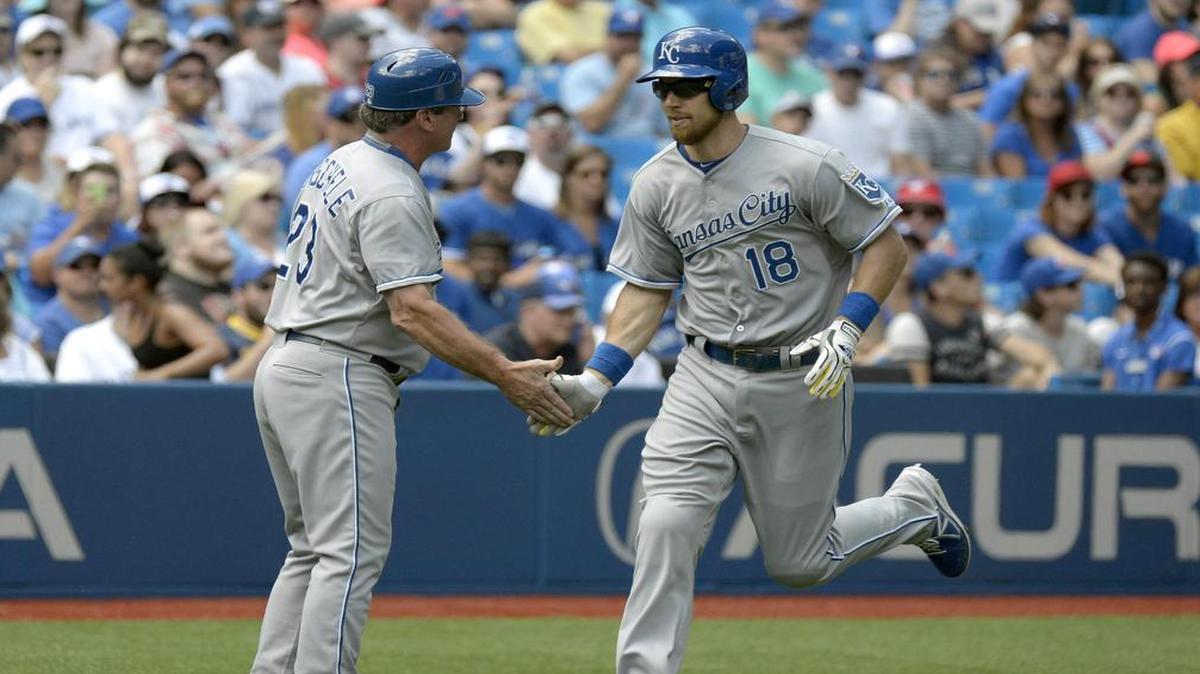 
Ben Zobrist (right) slapped hands with Royals third base coach Mike Jirschele after hitting a solo home run in the first inning. It was the first of two home runs hit by Zobrist.
