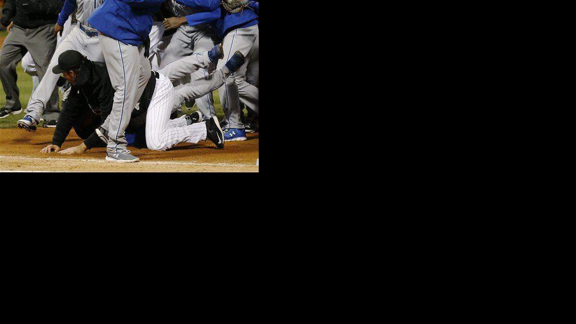 The White Sox's Jeff Samardzija (center) fights with the Royals players during the seventh inning of Thursday's baseball game Chicago.