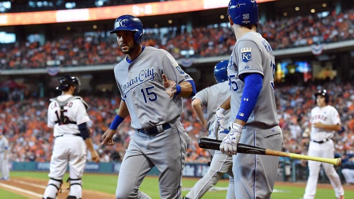 
Kansas City Royals right fielder Alex Rios was welcomed by first baseman Eric Hosmer after Rios scored in the eighth inning.
