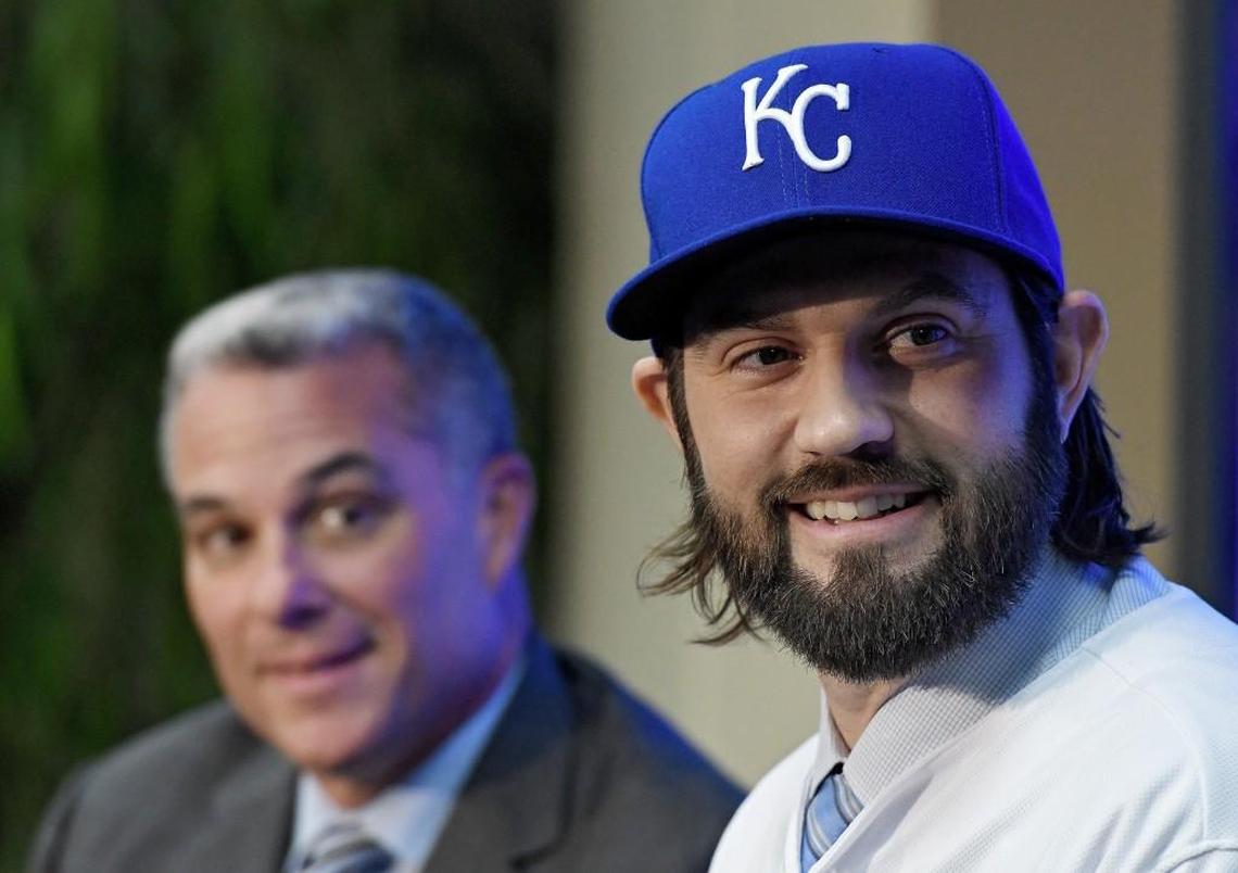 Royals general manager Dayton Moore (left) signed Jason Hammel to a two-year contract in February.