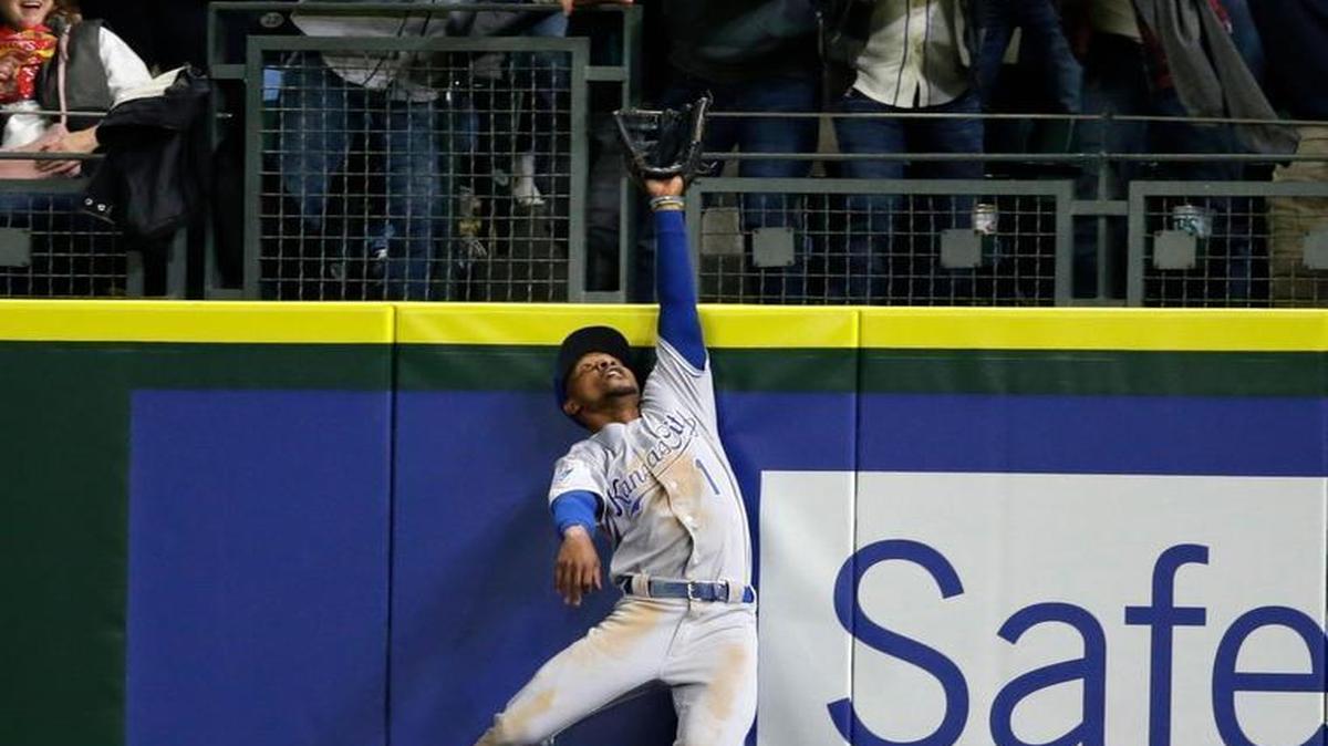 Royals right fielder Jarrod Dyson couldn’t snag a solo home run by the Mariners Seth Smith that broke up a no-hitter by the Royals’s Kris Medlen Friday in Seattle.