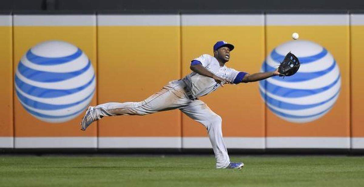 Kansas City Royals center fielder Lorenzo Cain dived to make this catch on a drive by J.J. Hardy during the sixth inning in game two of the American League Championship Series on Saturday, Oct. 11, 2014, at Oriole Park at Camden Yards in Baltimore.