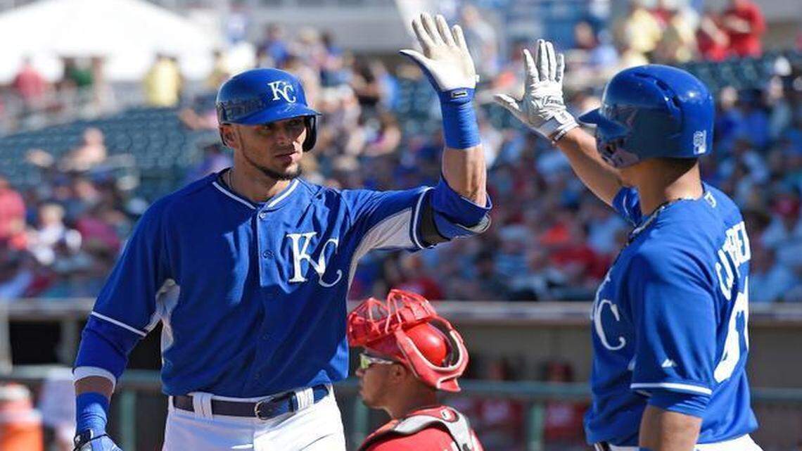 
Kansas City Royal Paulo Orlando was congratulated by Cheslor Cuthbert after Orlando hit a home run during a March 7, 2015, spring training game against the Cincinnati Reds in Surprise, Ariz.
