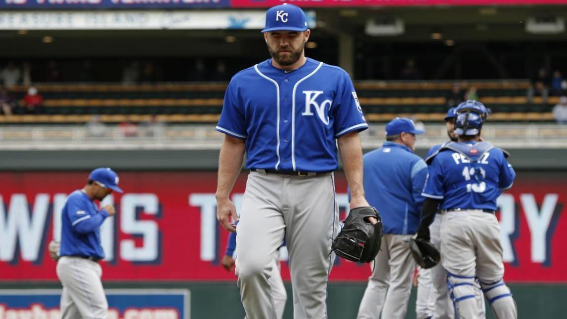 Kansas City Royals pitcher Nate Karns walked to the dugout after he gave up a three-run triple to Minnesota Twins' Miguel Sano in the seventh inning Wednesday, April 5, 2017, in Minneapolis. The Twins won 9-1.