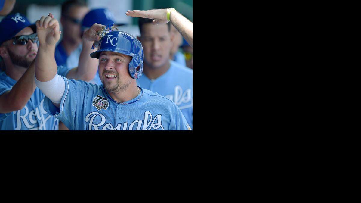 
Since Eric Hosmer left the lineup after getting hit on the wrist by a pitch on July 20, Billy Butler has made five starts at first base, and he heated up during the weekend series against Cleveland, going six for nine in the last three games, including two mammoth, game-winning home runs. On Sunday, he celebrated with teammates after scoring on a second-inning single by Jarrod Dyson.
