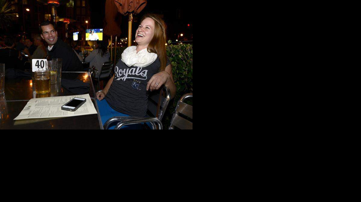 
Amy Mark celebrated the win by her hometown Royals in enemy territory Wednesday at a bar across from AT&T Park in downtown San Francisco. She’s there for work. 
