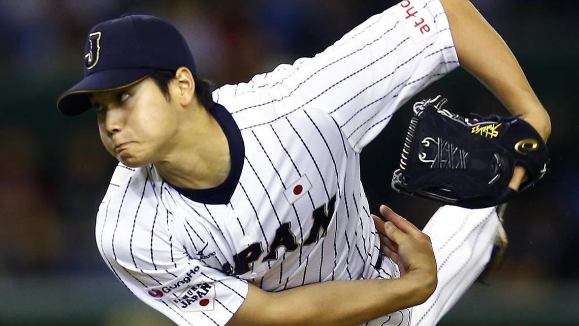 FILE - In this Nov. 19, 2015, file photo, Japan’s Shohei Ohtani pitches against South Korea during the first inning of their semifinal game at the Premier12 world baseball tournament at Tokyo Dome in Tokyo.