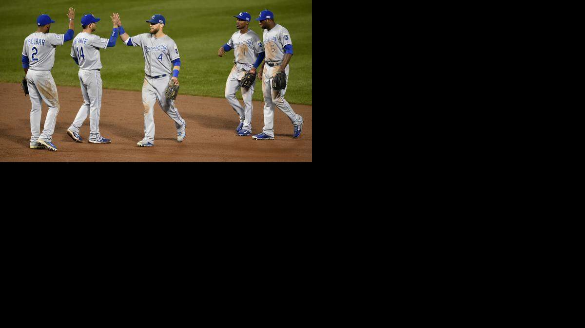 
Kansas City Royals left fielder Alex Gordon (4) was congratulated by his teammates after the Royals' 8-6 victory over the Baltimore Orioles during Friday's ALCS Game 1 on October 11, 2014 at Camden Yards in Baltimore, MD.
