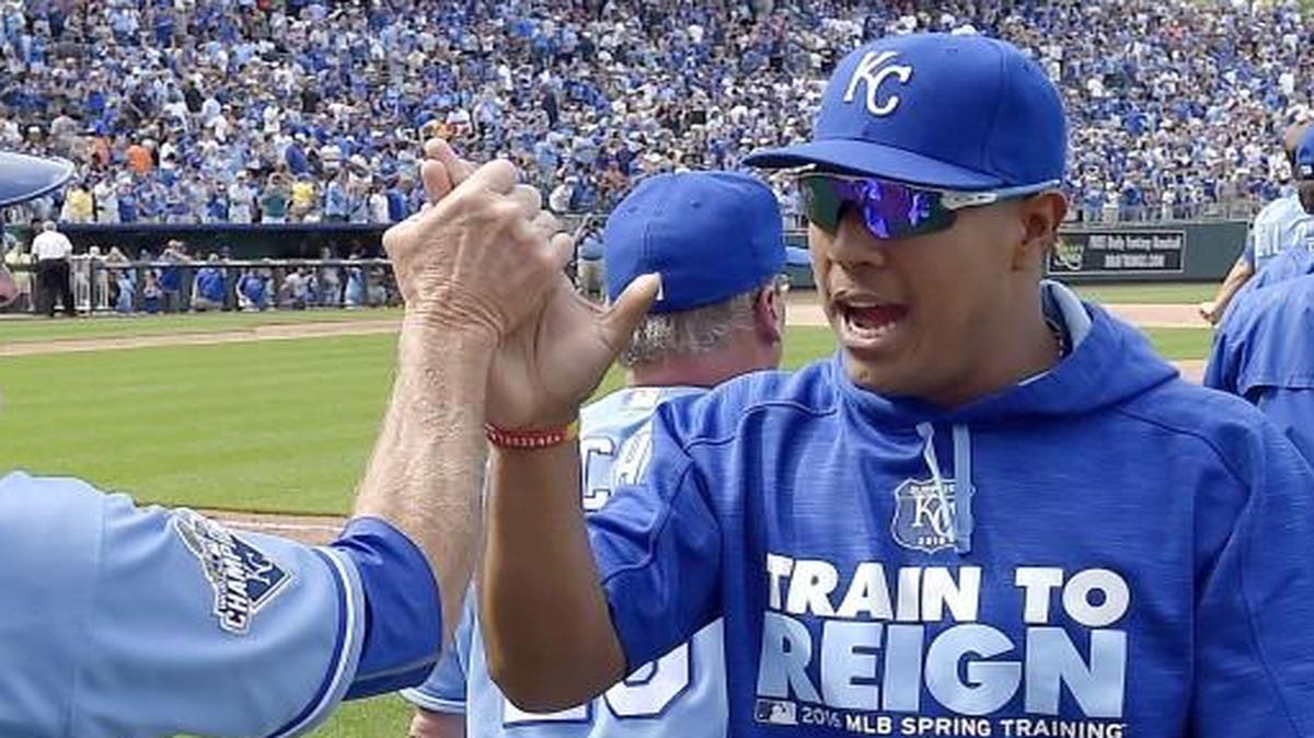 Kansas City Royals' Salvador Perez celebrates with first base coach Rusty Kuntz after the team’s 5-4 win over the Chicago White Sox on May 29, 2016, at Kauffman Stadium in Kansas City, Mo.