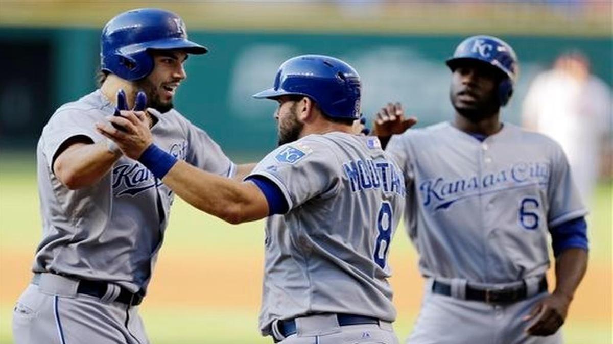 
The Royals Eric Hosmer (left) is congratulated by Mike Moustakas after Hosmer hit a three-run homer off Indians starting pitcher Cody Anderson in the first inning of Monday’s baseball game in Cleveland. Moustakas and Lorenzo Cain (right) scored on the play.

