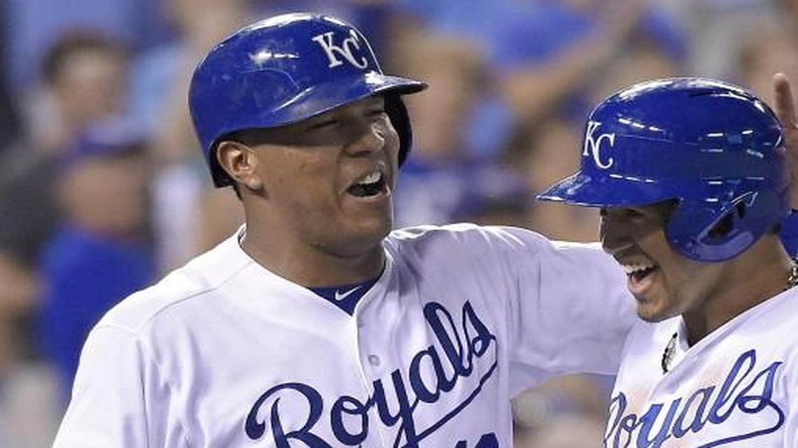 
Teammate Salvador Perez (left) celebrated Royals third baseman Cheslor Cuthbert after Cuthbert, a rookie who was called up to the big leagues on Tuesday, hit his first career home run, a two-run blow, in the fifth inning against the Detroit Tigers on Wednesday night at Kauffman Stadium. The Royals won the game 12-1.
