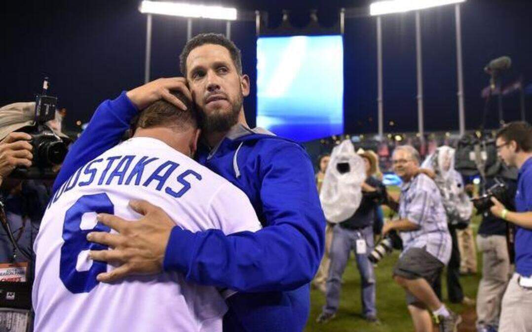 
After three consecutive extra-innings victories, the Royals find themselves one win away from the American League Championship Series. James Shields faces Anaheim southpaw C.J. Wilson on Sunday night. Shields hugged teammate Mike Moustakas after the Royals defeated Oakland Athletics 9-8 in 12 innings on Tuesday night in the American League wild-card game at Kauffman Stadium.
