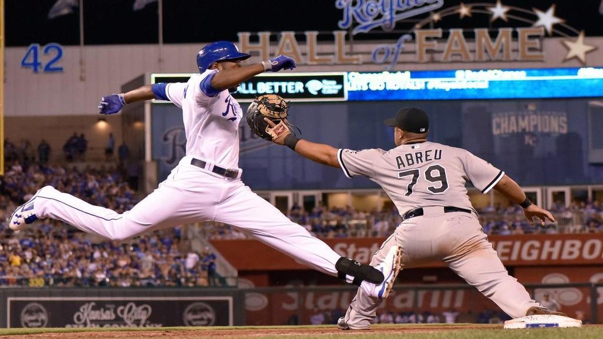 
White Sox first baseman Jose Abreu (79) got the ball in time for the third out of the sixth inning on the Royals' Lorenzo Cain during Friday's baseball game at Kauffman Stadium.
