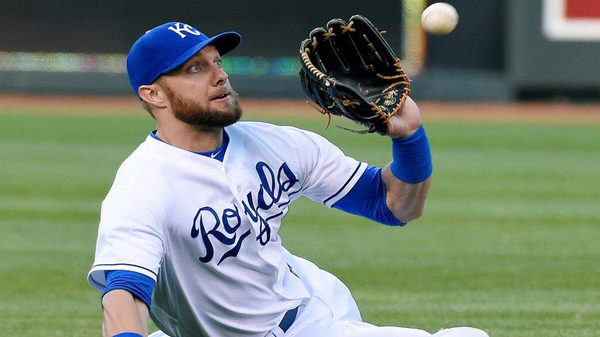 
Royals left fielder Alex Gordon makes a sliding catch for an out on the Twins' Danny Santana during Monday's baseball game at Kauffman Stadium.
