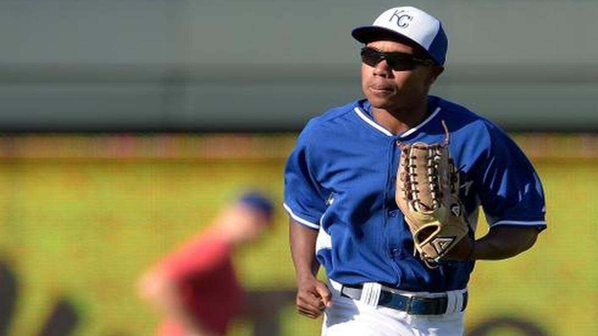 
New call-up Terrance Gore (0) ran during warmups before the Royals’ game against the Texas Rangers on Tuesday night at Kauffman Stadium.
