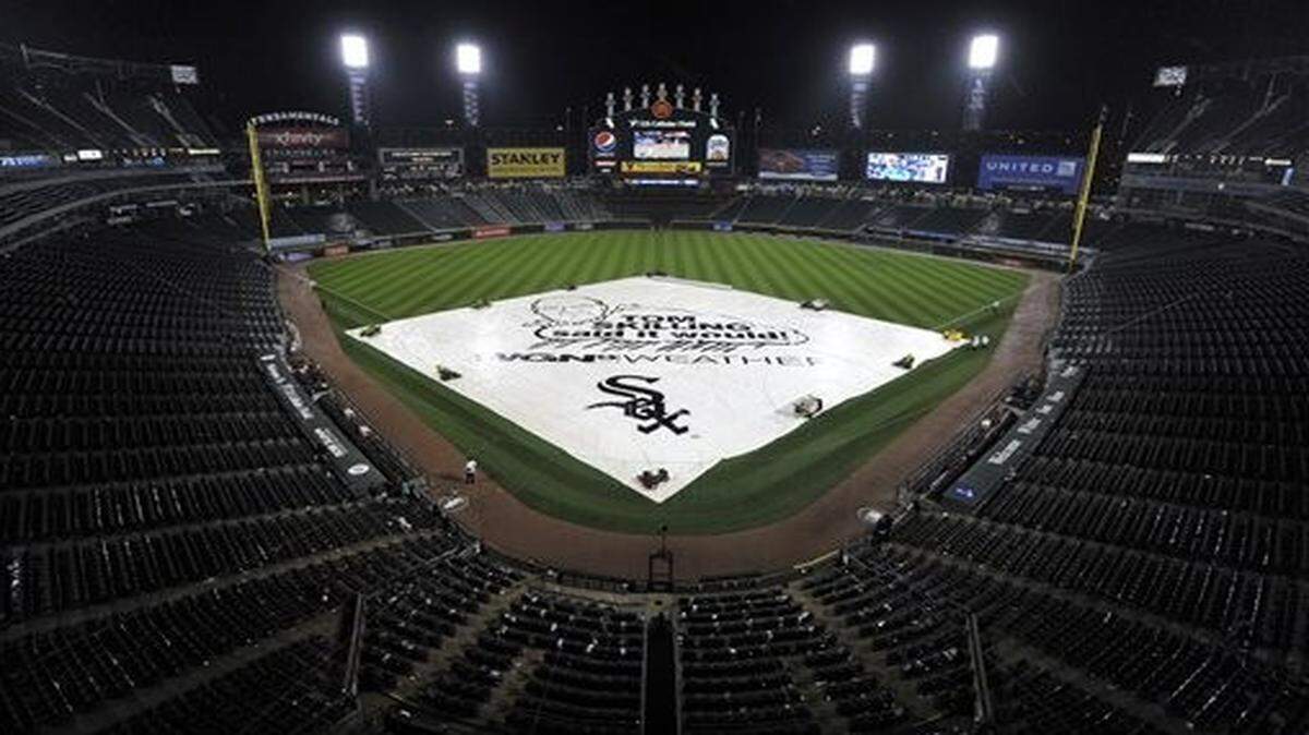 
The tarp covered the infield at U.S. Cellular Field in Chicago during a rain delay in Friday’s baseball game between the White Sox and Royals. The game was suspended after eight innings with the score 2-2 and will be completed before Saturday afternoon’s game.
