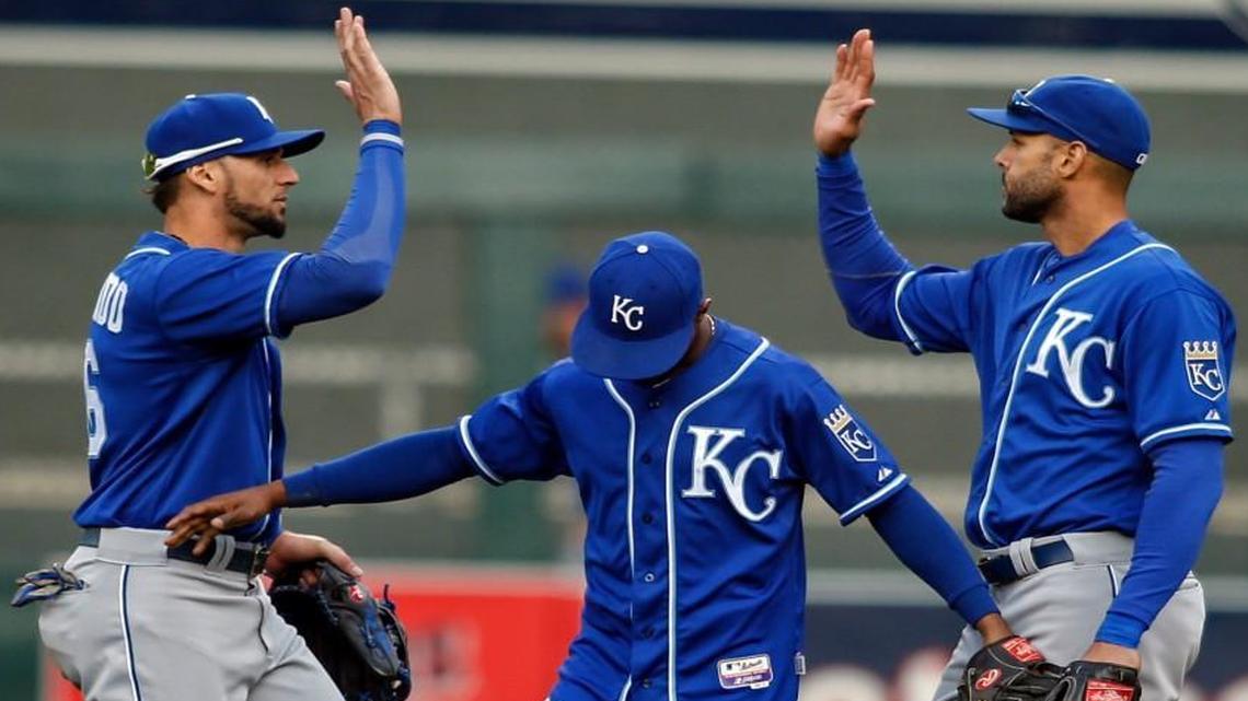 
Royals left fielder Paulo Orlando (from left), center fielder Jarrod Dyson and right fielder Alex Rios celebrated after Kansas City beat the Minnesota Twins 6-1 in the final regular-season game on Sunday in Minneapolis. The win gave Kansas City the best record in the American League and home-field advantage throughout the postseason.
