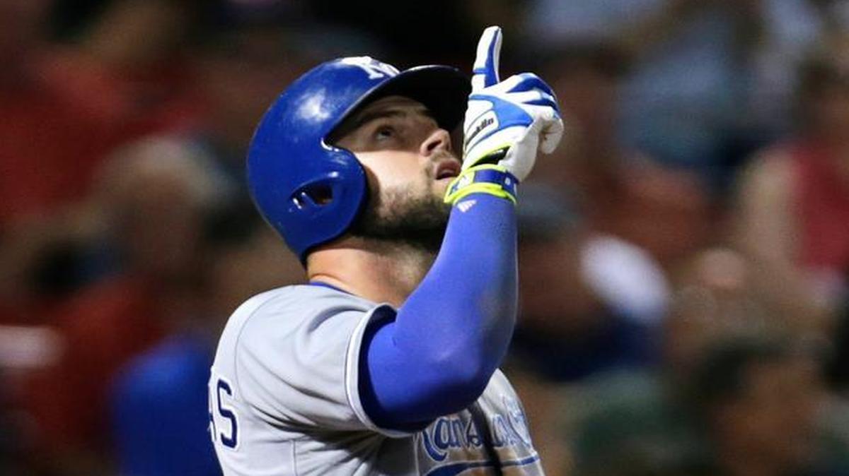 
The Royals' Mike Moustakas points upward after crossing home plate on his solo home run against the Red Sox during Thursday’s baseball game in Boston.
