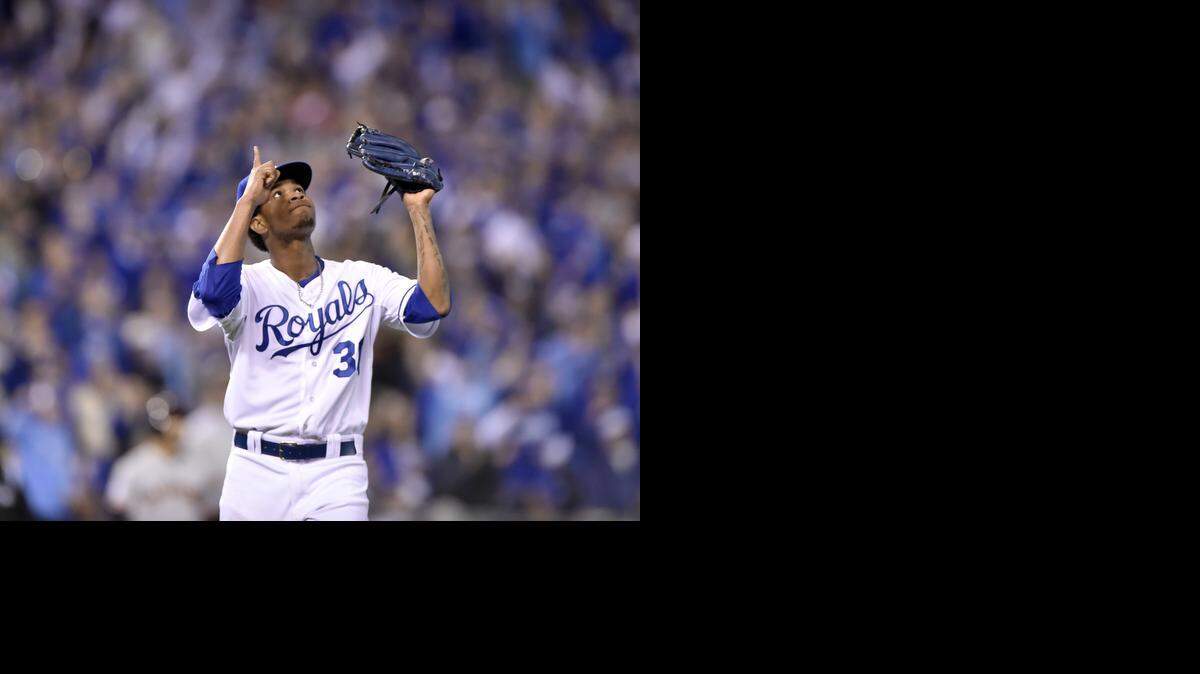 Kansas City Royals starting pitcher Yordano Ventura pointed to the heavens after San Francisco Giants catcher Buster Posey hit into a double play to end the third inning in game six of the World Series on Tuesday, October 28, 2014, at Kauffman Stadium in Kansas City, Mo.