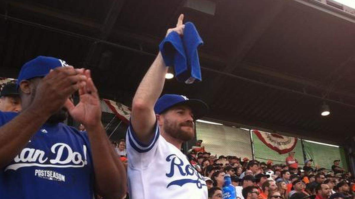 
Justin Salazar of Lee’s Summit, dressed in a 1985-style Royals uniform, was among a crowd of fans in blue cheering for Kansas City on Friday at AT&T Park in San Francisco.
