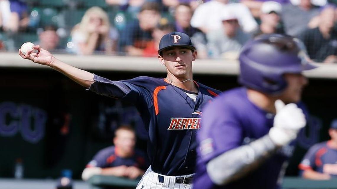 Pepperdine pitcher A.J. Puckett, left, was drafted by the Royals on Thursday.
