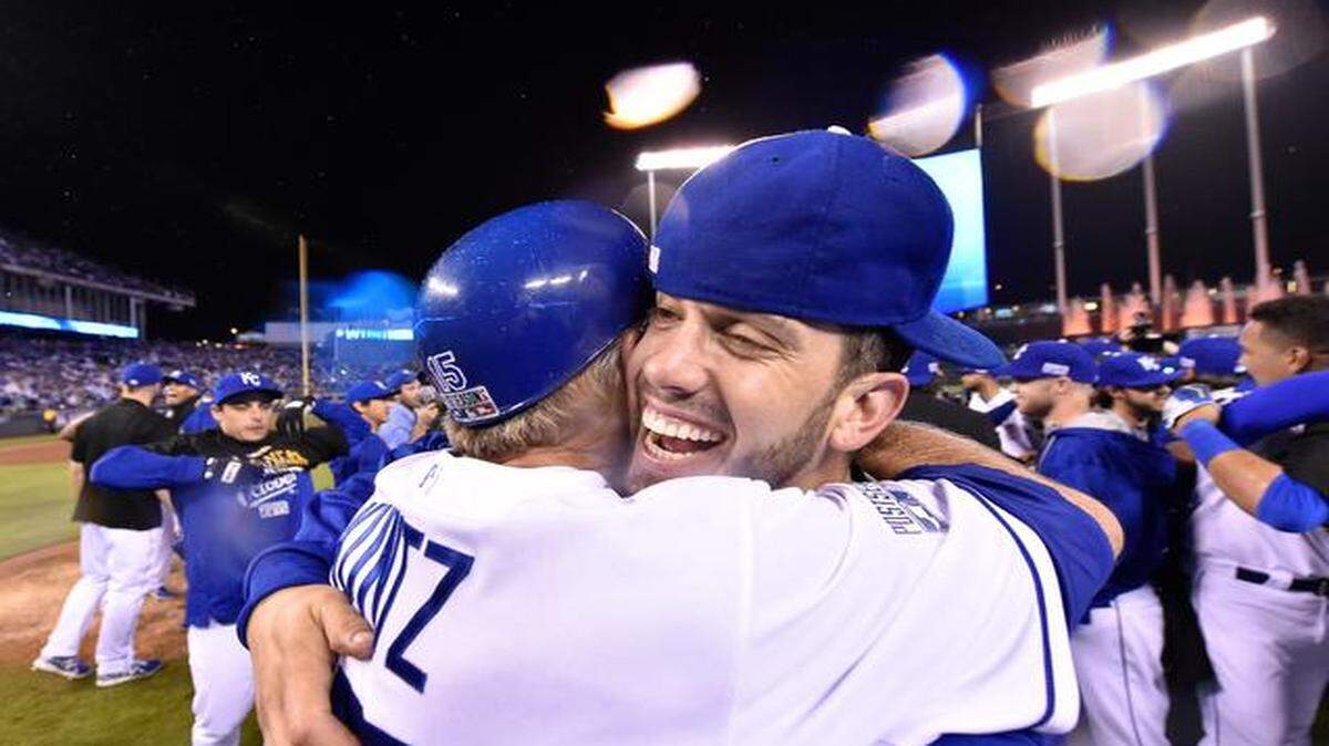 Kansas City Royals starting pitcher James Shields and Kansas City Royals first base coach Rusty Kuntz embraced after the Royals defeated the Los Angeles Angels 8-3 at Sunday's ALDS playoff baseball game on October 5, 2014 at Kauffman Stadium in Kansas City, MO.