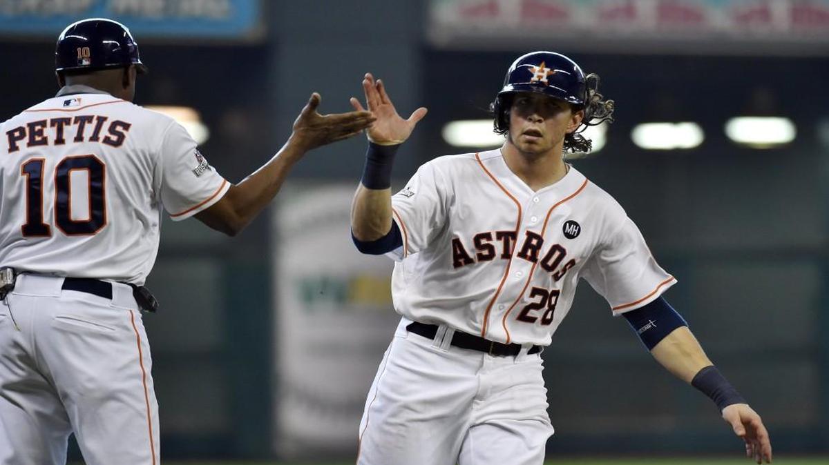 
Houston Astros left fielder Colby Rasmus rounded the bases after hitting a solo homer in the seventh inning of Game 4 in Houston.
