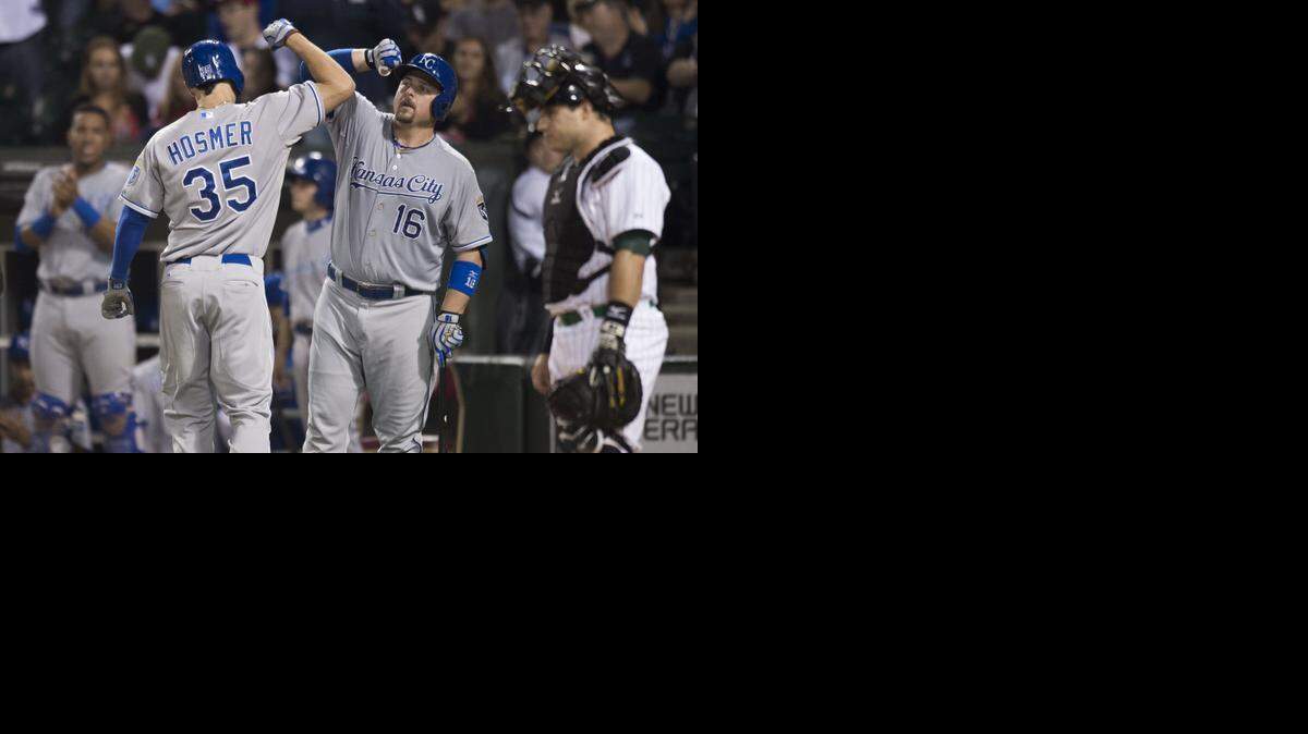 
Kansas City Royals starting pitcher James Shields (33) and Kansas City Royals designated hitter Billy Butler (16) celebrate Hosmer's solo home run in the sixth inning during the Kansas City Royals and Chicago White Sox game at U. S. Cellular Field on Thursday, September 25, 2014, in Chicago, Illinois.
