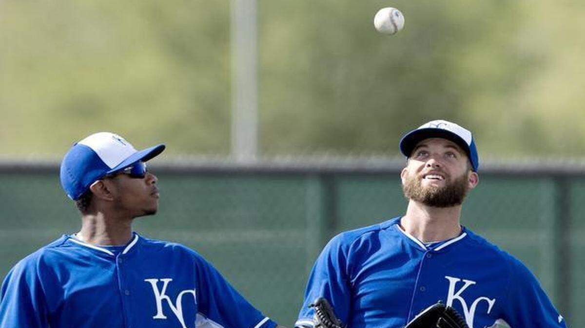 
Kansas City Royals pitchers Yordano Ventura (left) and Danny Duffy vied for a tossed baseball during a spring training workout last year in Surprise, Ariz.
