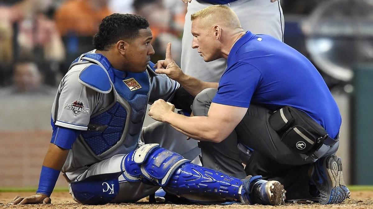 
A trainer checked out catcher Salvador Perez after Perez was hit hard by a foul tip in the sixth inning of Game 4 of the ALDS at Minute Maid Park in Houston.
