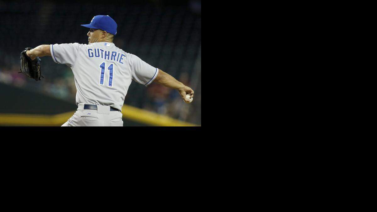 
Kansas City Royals' Jeremy Guthrie throws a pitch against the Arizona Diamondbacks during the first inning of a baseball game Thursday, Aug. 7, 2014, in Phoenix. 
