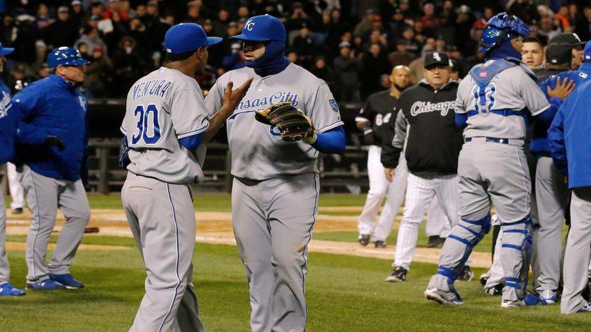 
 Royals starting pitcher Yordano Ventura (30) is pulled aside by teammate Mike Moustakas as the benches clear during Thursday’s baseball game against the White Sox in Chicago. The Royals won 3-2 in 13 innings.

