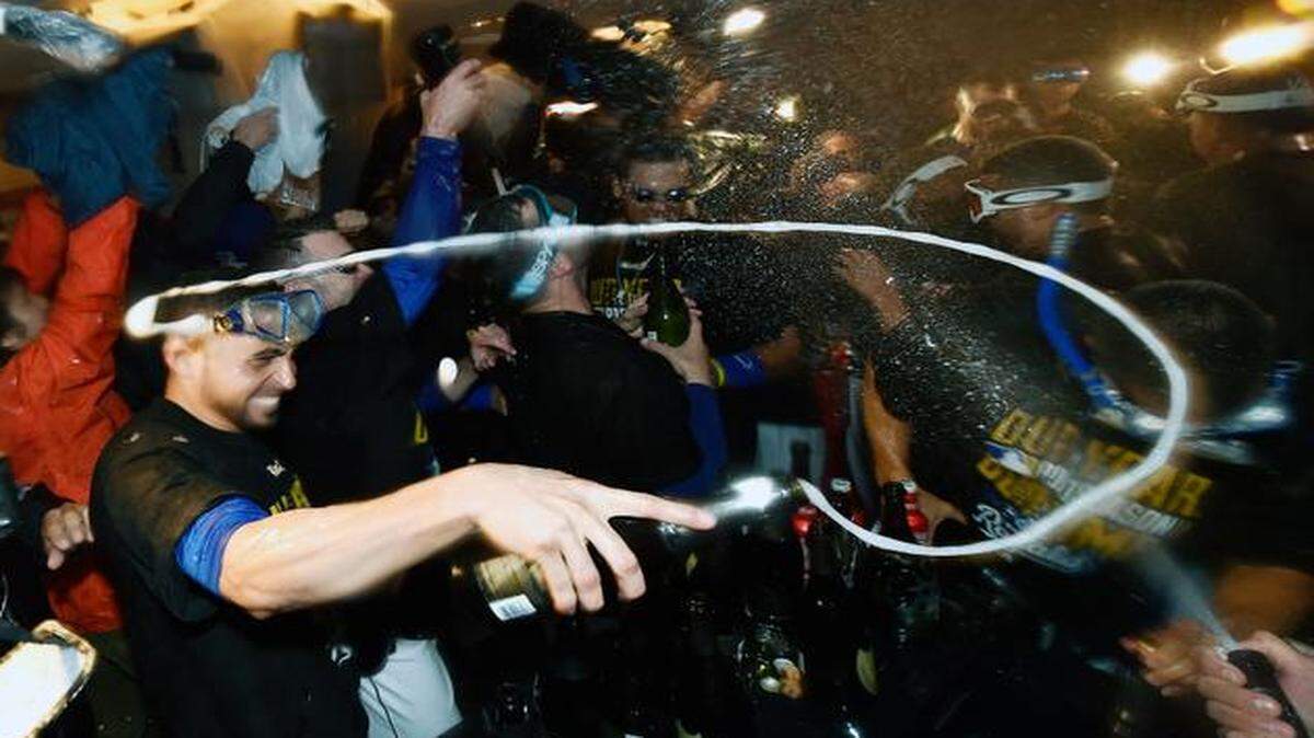 
The Royals’ Omar Infante and his teammates are getting good at this celebrating stuff after clinching the AL Division Series on Sunday.


