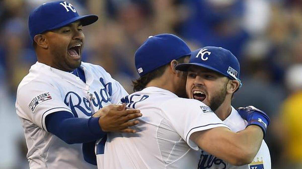 
Royals second baseman Christian Colon (left), Royals first baseman Eric Hosmer and third baseman Mike Moustakas celebrated after they beat the Orioles 2-1 on Wednesday in game four of the ALCS.
