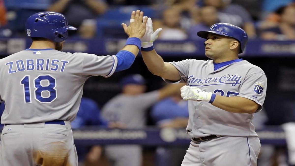 
The Royals' Kendrys Morales (right) high-fives Ben Zobrist after hitting a two-run homer off Rays starting pitcher Erasmo Ramirez during the third inning of Friday’s baseball game in St. Petersburg, Fla.
