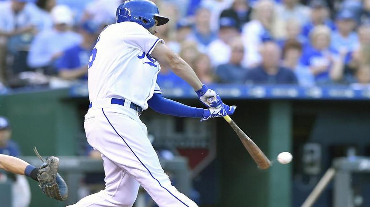 After Tampa Bay pitcher Drew Smyly issued an intentional walk to Lorenzo Cain, the next batter, Eric Hosmer, connects on a single that scored Whit Merrifield in the third inning of the Royals’ 10-5 win over the Rays on Tuesday night at Kauffman Stadium.