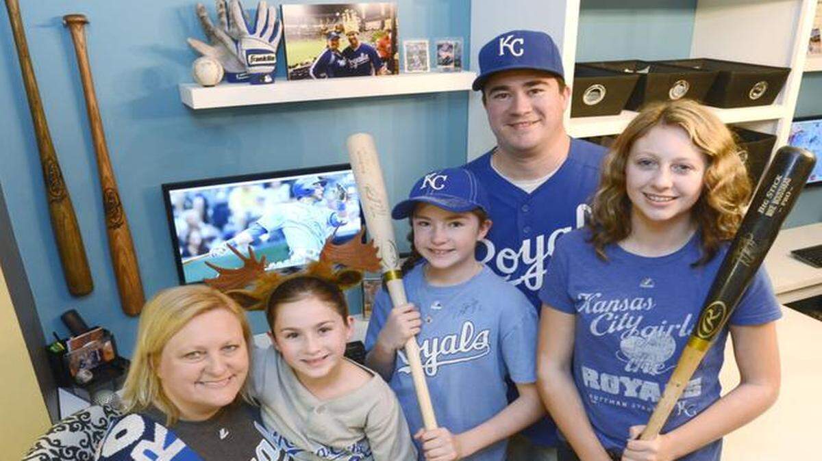 
Avid Royals fans Michelle and Jim Pointer of Overland Park and their daughters, Karis Pointer (from left), 10, Ella Pointer, 12, and Reagan Goforth, 13, gave up their tickets to the Wild Card Game so they wouldn't jinx the team. Instead, they watched the game at the Power & Light District. 

