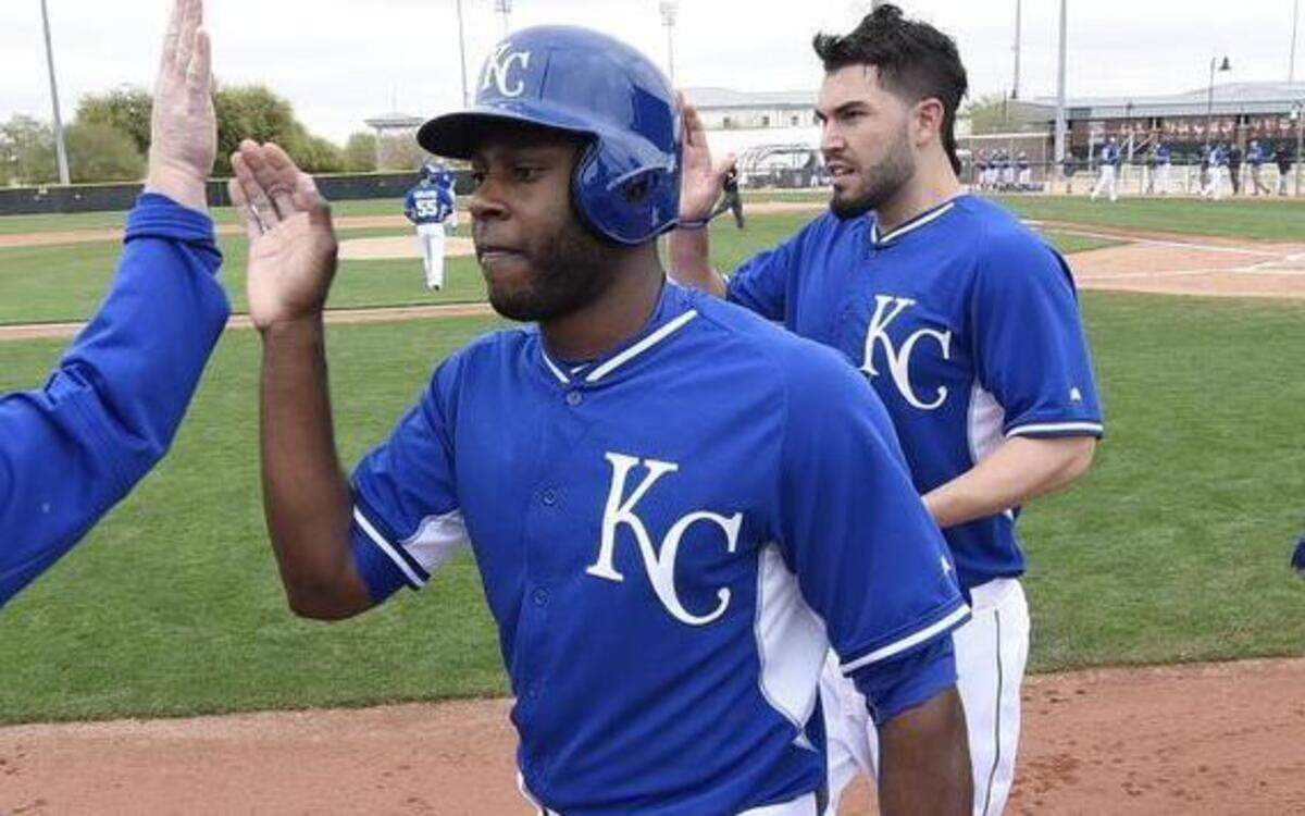 
Lorenzo Cain (center) and Eric Hosmer both scored in the Royals’ first intrasquad game of spring Training Sunday in Surprise, Ariz.
