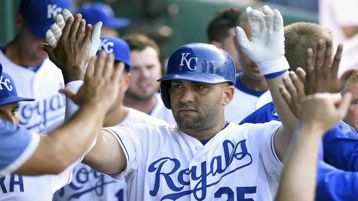 
Teammates congratulated Royals designated hitter Kendrys Morales (25) after Morales hit a two-run home run in the fifth inning against the Boston Red Sox on Saturday night at Kauffman Stadium.
