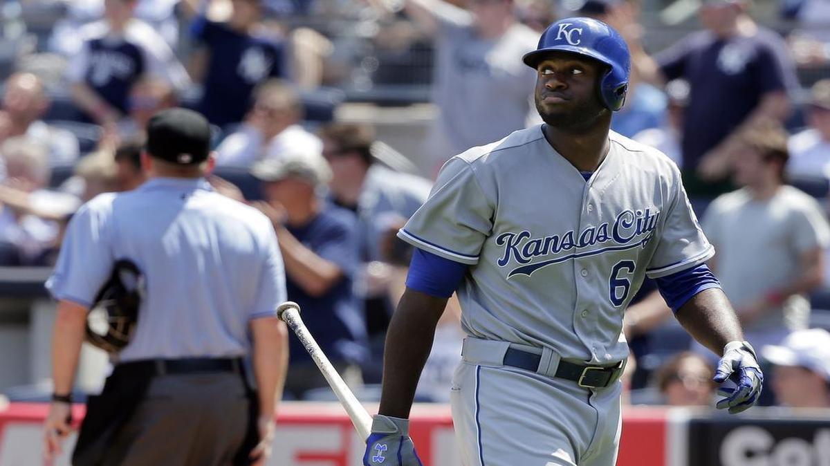 
The Royals’ Lorenzo Cain looked at the bad news on the scoreboard after striking out with two men on base, ending the top of the fifth inning against the Wednesday in New York. (AP Photo/Julie Jacobson)

