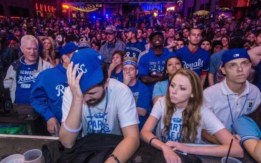 
In the Power & Light District, Christian Wrisner and Amy Hartgrove of Kansas City couldn’t conceal their reactions after seeing the Royals’ defeat on the big screen. 

