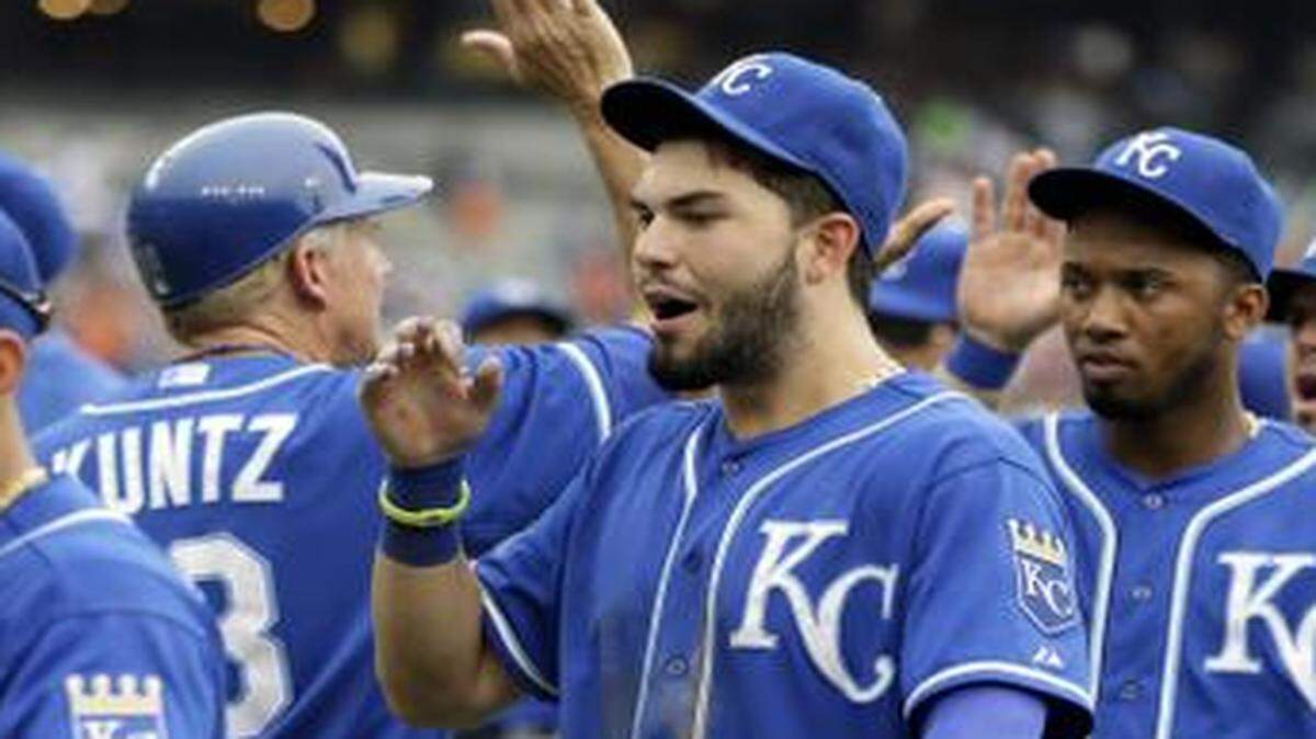 
The Royals' Eric Hosmer and teammates celebrate Wednesday’s 2-1 win over the Tigers in Detroit. It was Kansas City’s 10th straight win.
