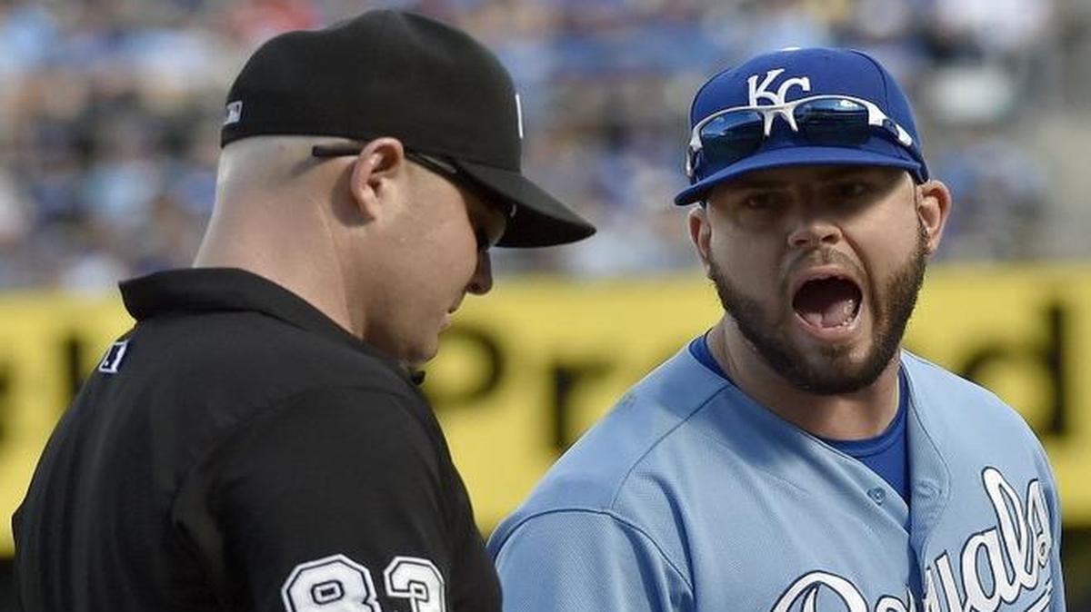 
Royals third baseman Mike Moustakas (8) told third-base umpire Mike Estabrook that the Indians’ Francisco Lindor didn’t tag up at before breaking for home. After the play was reviewed twice, the run was voided, ending the top of the seventh inning.
